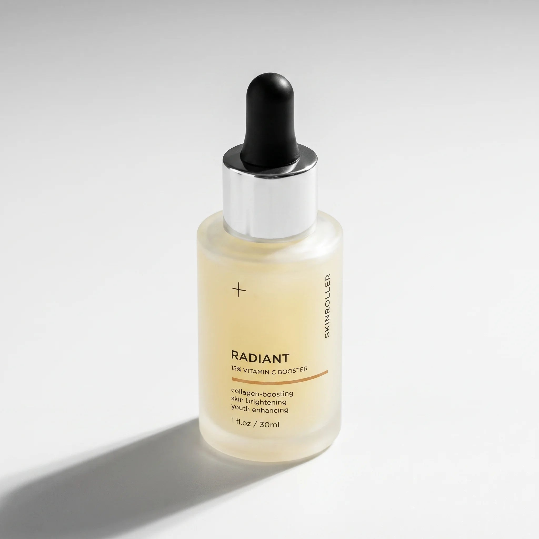Image of Skinroller Radiant 15% Vitamin C Booster serum bottle closeup