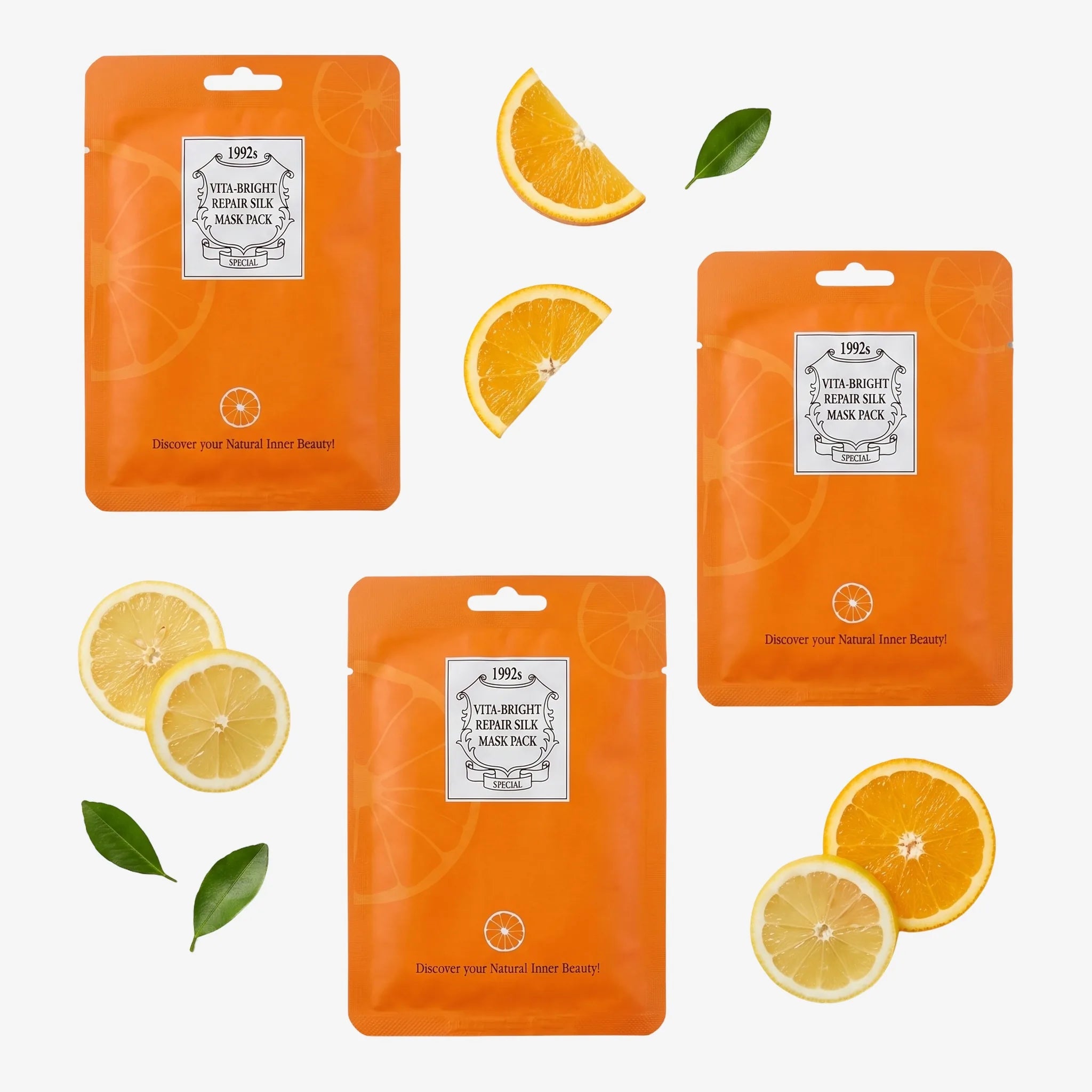 Image of Vitamin C Sheet Mask 3-pack – tre sachets med apelsin- och citronskivor, flatlay