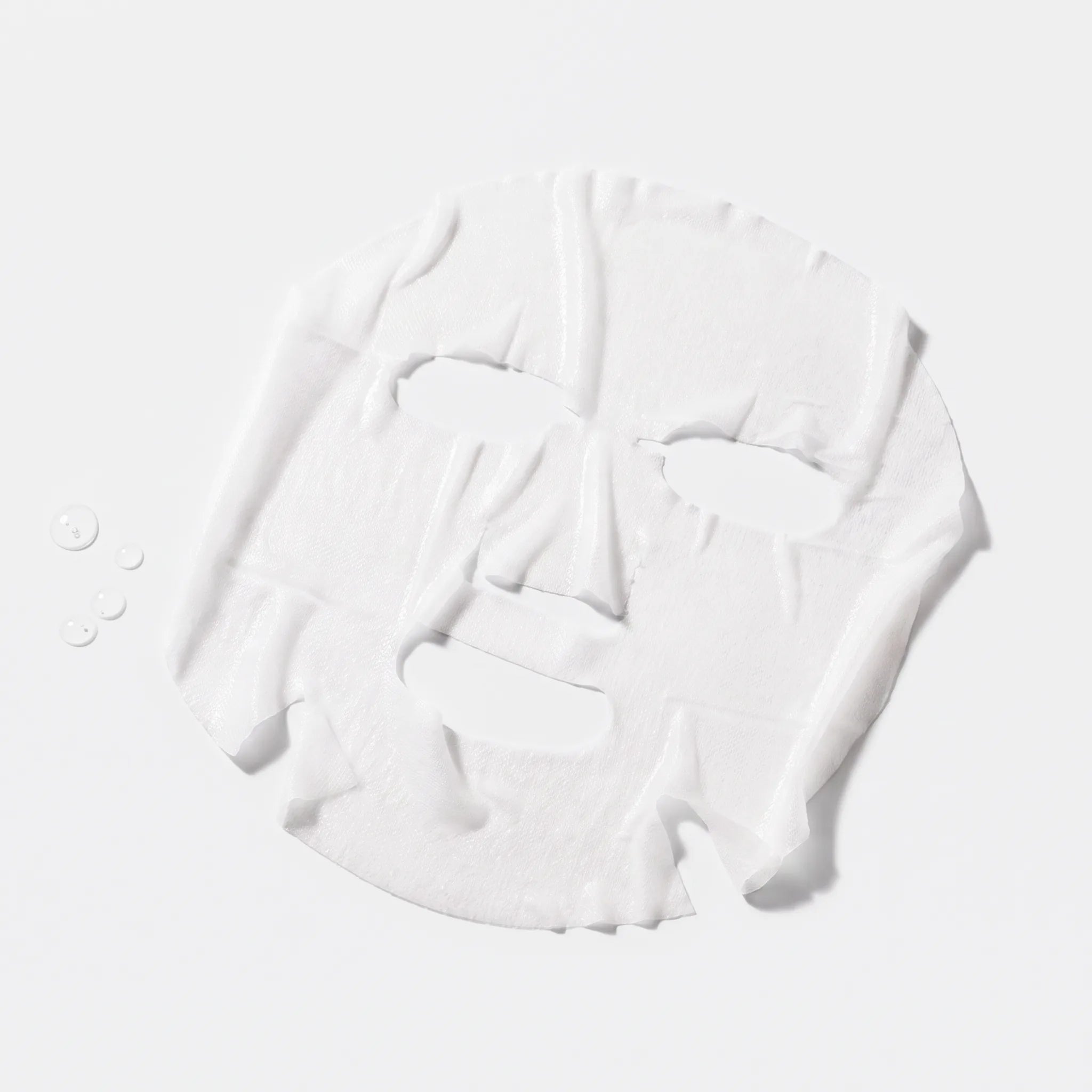 Image of Vitamin C Sheet Mask utvikt med essence-droppar – vit ansiktsmask i tyg med nätstruktur