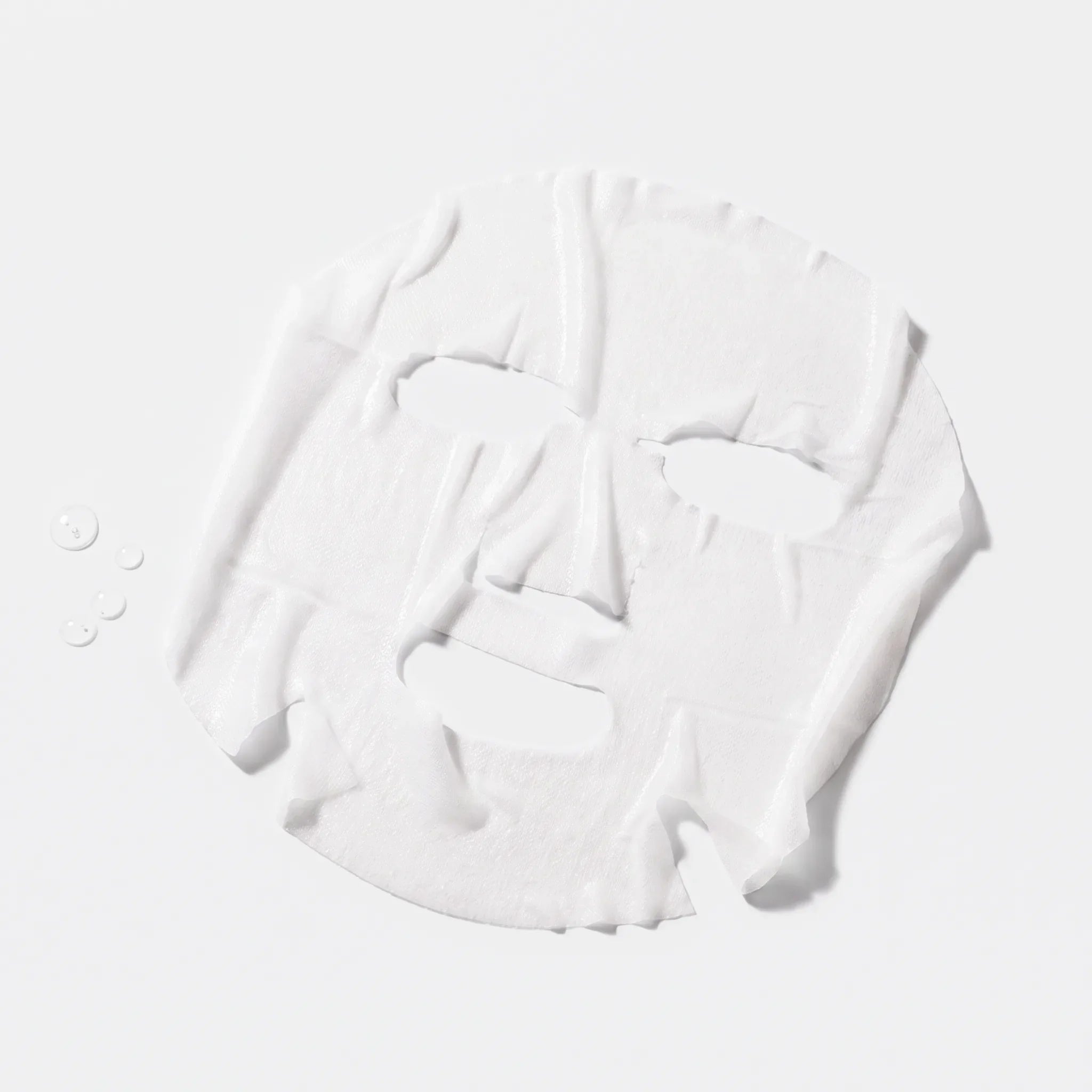 Image of Vitamin C Sheet Mask utvikt med essence-droppar – vit ansiktsmask i tyg med nätstruktur